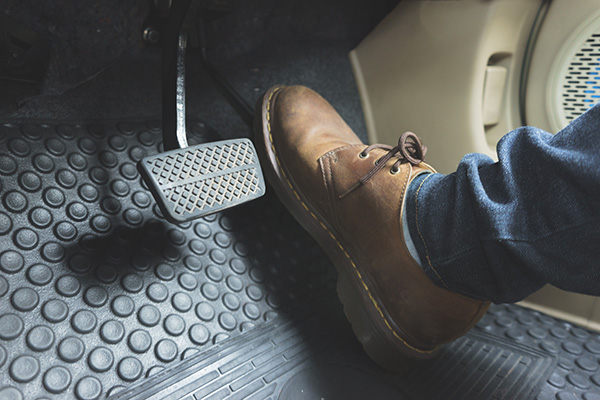 Why Your Car Hesitates When You Press the Gas Pedal